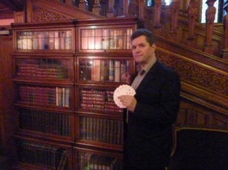 Smart man in a library
