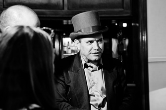 Magician with hat in black and white