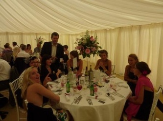 Wedding Magician with table of ladies
