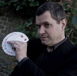 Magician with card fan