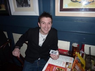 Smiling man in pub